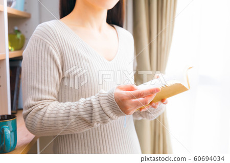 A woman reading 60694034