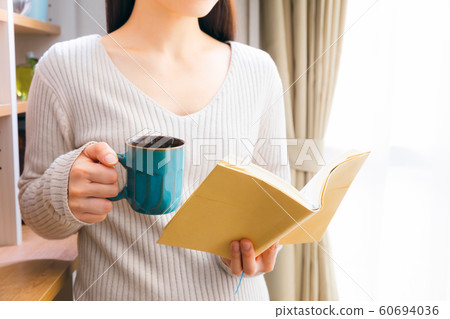 A woman reading 60694036