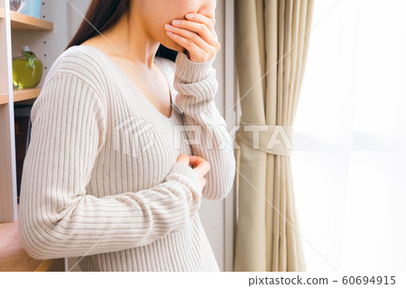 A woman with poor health 60694915