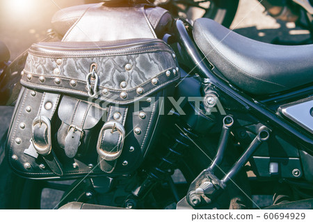 Leather travel bag on a motorcycle. Motorbike 60694929