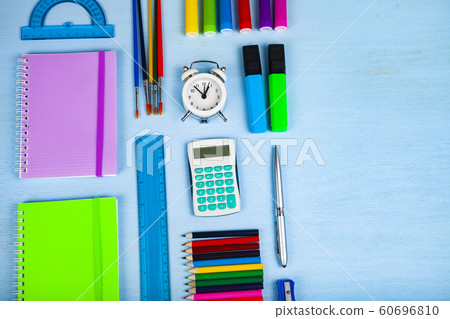 Items for the school on a wooden table. Items for the school on a wooden table. 60696810