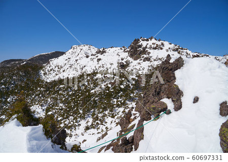 Look at the west from Kitatsuyatsugatake Mitsutake I peak in winter 60697331