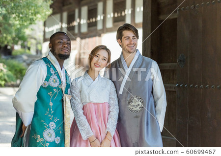 Holidays and tourism concept, group of smiling friends traveling in Seoul, Korea 419 60699467