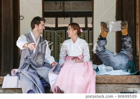 Holidays and tourism concept, group of smiling friends traveling in Seoul, Korea 306 Holidays and tourism concept, group of smiling friends traveling in Seoul, Korea 306 60699589