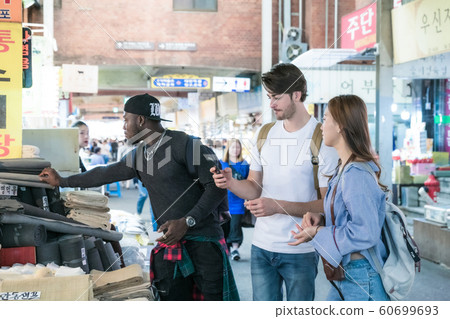 Holidays and tourism concept, group of smiling friends traveling in Seoul, Korea 149 60699693