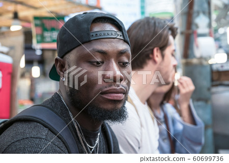 Holidays and tourism concept, group of smiling friends traveling in Seoul, Korea 105 60699736