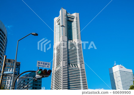 View of Yokohama Landmark Tower from Sakuragicho Station in front of Yokohama cityscape in Japan (green light) View of Yokohama Landmark Tower from Sakuragicho Station in front of Yokohama cityscape in Japan (green light) 60699900
