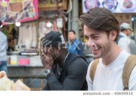 Holidays and tourism concept, group of smiling friends traveling in Seoul, Korea 119 Holidays and tourism concept, group of smiling friends traveling in Seoul, Korea 119 60699918