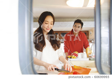 Happy young couple, camping or trip in Jeju, Korea 187 Happy young couple, camping or trip in Jeju, Korea 187 60699993