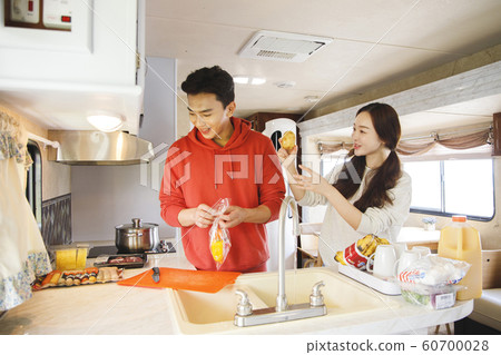 Happy young couple, camping or trip in Jeju, Korea 152 Happy young couple, camping or trip in Jeju, Korea 152 60700028