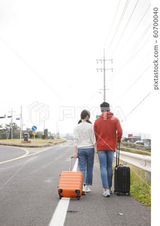 Happy young couple, camping or trip in Jeju, Korea 175 Happy young couple, camping or trip in Jeju, Korea 175 60700040