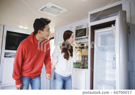 Happy young couple, camping or trip in Jeju, Korea 108 Happy young couple, camping or trip in Jeju, Korea 108 60700057