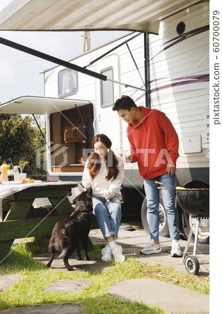 Happy young couple, camping or trip in Jeju, Korea 139 Happy young couple, camping or trip in Jeju, Korea 139 60700079