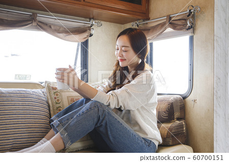 Happy young couple, camping or trip in Jeju, Korea 181 Happy young couple, camping or trip in Jeju, Korea 181 60700151