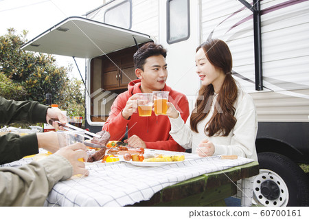 Happy young couple, camping or trip in Jeju, Korea 161 Happy young couple, camping or trip in Jeju, Korea 161 60700161