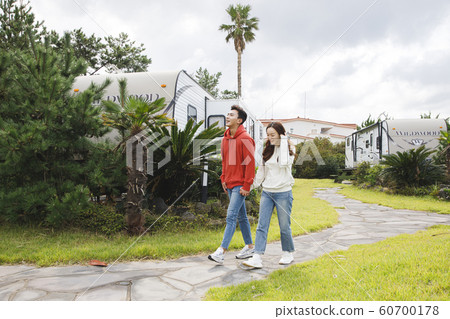 Happy young couple, camping or trip in Jeju, Korea 155 60700178