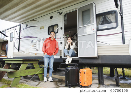 Happy young couple, camping or trip in Jeju, Korea 142 Happy young couple, camping or trip in Jeju, Korea 142 60700196