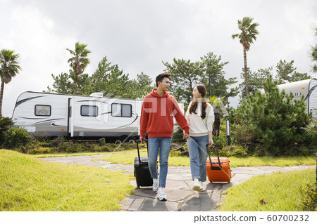 Happy young couple, camping or trip in Jeju, Korea 089 Happy young couple, camping or trip in Jeju, Korea 089 60700232