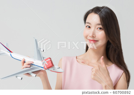 Happy single woman life, an attractive smiling woman holding shopping bags 351 Happy single woman life, an attractive smiling woman holding shopping bags 351 60700892