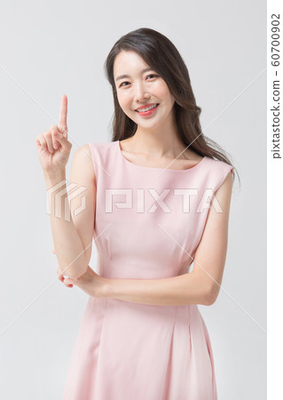 Happy single woman life, an attractive smiling woman holding shopping bags 335 Happy single woman life, an attractive smiling woman holding shopping bags 335 60700902