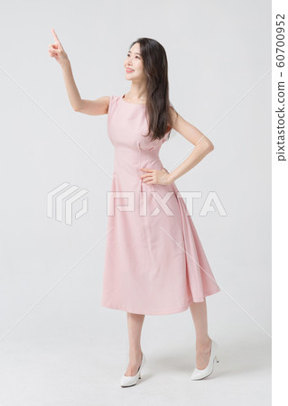 Happy single woman life, an attractive smiling woman holding shopping bags 283 Happy single woman life, an attractive smiling woman holding shopping bags 283 60700952