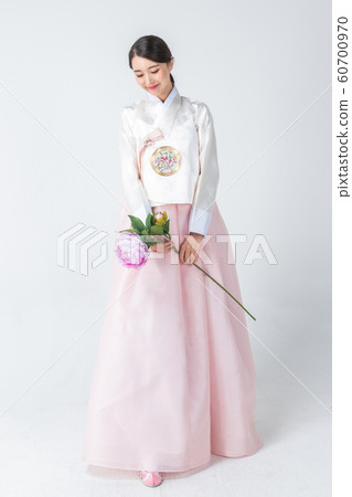 Happy single woman life, an attractive smiling woman holding shopping bags 262 60700970