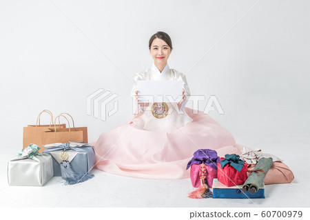 Happy single woman life, an attractive smiling woman holding shopping bags 244 Happy single woman life, an attractive smiling woman holding shopping bags 244 60700979