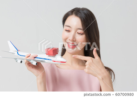 Happy single woman life, an attractive smiling woman holding shopping bags 298 Happy single woman life, an attractive smiling woman holding shopping bags 298 60700980