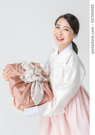 Happy single woman life, an attractive smiling woman holding shopping bags 204 Happy single woman life, an attractive smiling woman holding shopping bags 204 60700988