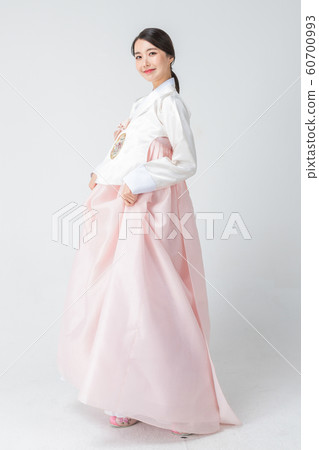 Happy single woman life, an attractive smiling woman holding shopping bags 193 Happy single woman life, an attractive smiling woman holding shopping bags 193 60700993