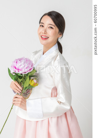 Happy single woman life, an attractive smiling woman holding shopping bags 197 60700995
