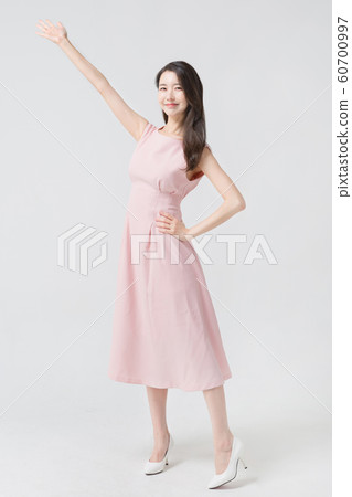 Happy single woman life, an attractive smiling woman holding shopping bags 291 Happy single woman life, an attractive smiling woman holding shopping bags 291 60700997