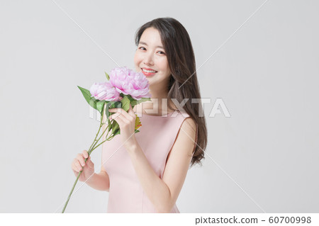 Happy single woman life, an attractive smiling woman holding shopping bags 309 Happy single woman life, an attractive smiling woman holding shopping bags 309 60700998