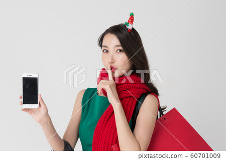 Happy single woman life, an attractive smiling woman holding shopping bags 170 Happy single woman life, an attractive smiling woman holding shopping bags 170 60701009