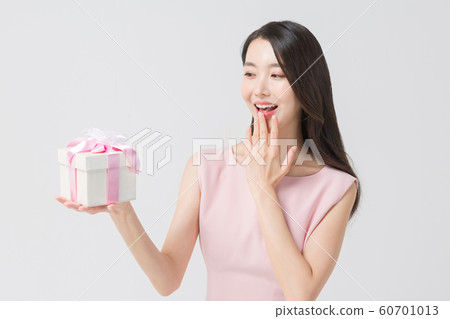 Happy single woman life, an attractive smiling woman holding shopping bags 396 Happy single woman life, an attractive smiling woman holding shopping bags 396 60701013
