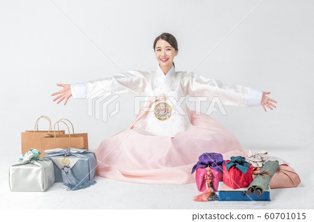 Happy single woman life, an attractive smiling woman holding shopping bags 273 Happy single woman life, an attractive smiling woman holding shopping bags 273 60701015