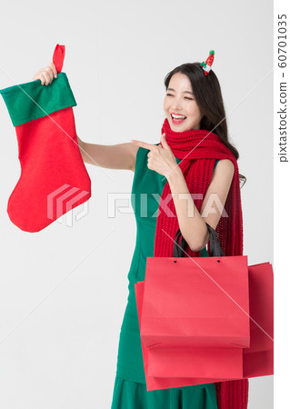 Happy single woman life, an attractive smiling woman holding shopping bags 165 Happy single woman life, an attractive smiling woman holding shopping bags 165 60701035