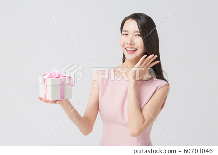 Happy single woman life, an attractive smiling woman holding shopping bags 365 Happy single woman life, an attractive smiling woman holding shopping bags 365 60701046