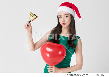 Happy single woman life, an attractive smiling woman holding shopping bags 128 Happy single woman life, an attractive smiling woman holding shopping bags 128 60701078