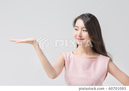 Happy single woman life, an attractive smiling woman holding shopping bags 299 Happy single woman life, an attractive smiling woman holding shopping bags 299 60701093