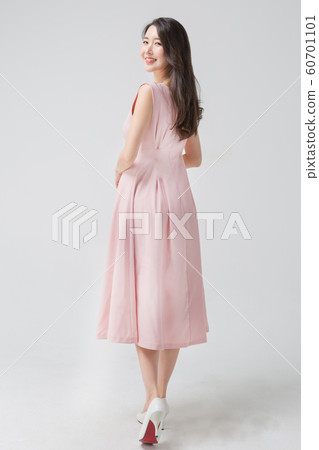 Happy single woman life, an attractive smiling woman holding shopping bags 295 Happy single woman life, an attractive smiling woman holding shopping bags 295 60701101