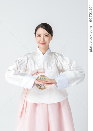 Happy single woman life, an attractive smiling woman holding shopping bags 192 Happy single woman life, an attractive smiling woman holding shopping bags 192 60701104
