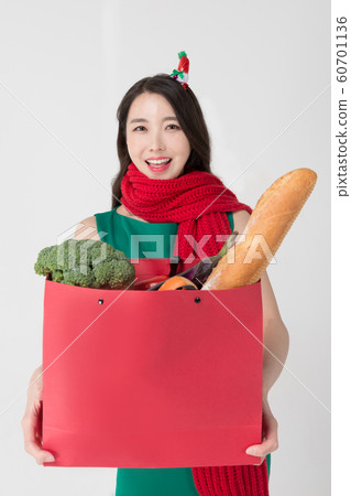 Happy single woman life, an attractive smiling woman holding shopping bags 157 60701136