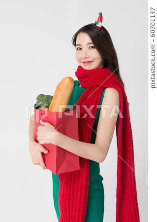 Happy single woman life, an attractive smiling woman holding shopping bags 169 Happy single woman life, an attractive smiling woman holding shopping bags 169 60701137