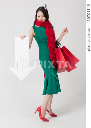 Happy single woman life, an attractive smiling woman holding shopping bags 155 Happy single woman life, an attractive smiling woman holding shopping bags 155 60701146