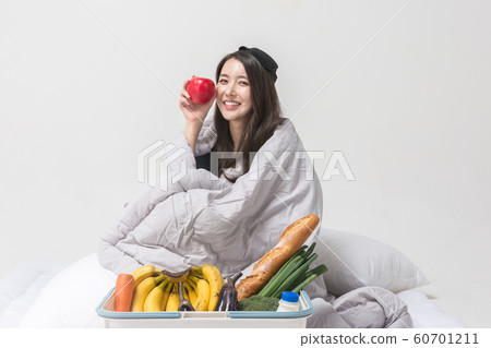 Happy single woman life, an attractive smiling woman holding shopping bags 041 Happy single woman life, an attractive smiling woman holding shopping bags 041 60701211