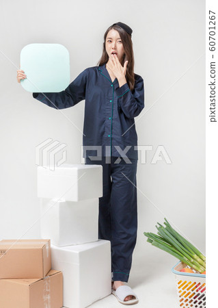 Happy single woman life, an attractive smiling woman holding shopping bags 006 60701267