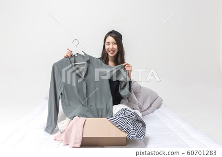 Happy single woman life, an attractive smiling woman holding shopping bags 028 60701283