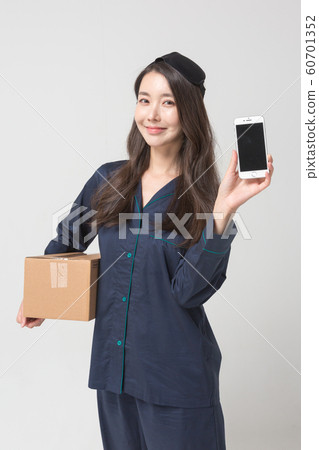 Happy single woman life, an attractive smiling woman holding shopping bags 030 60701352