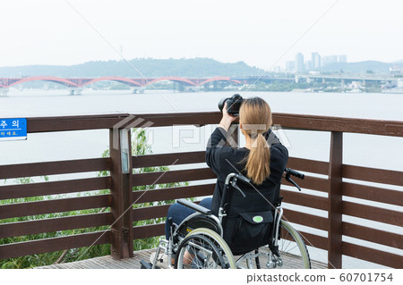 Disabled handicapped man sitting on wheelchair 067 Disabled handicapped man sitting on wheelchair 067 60701754